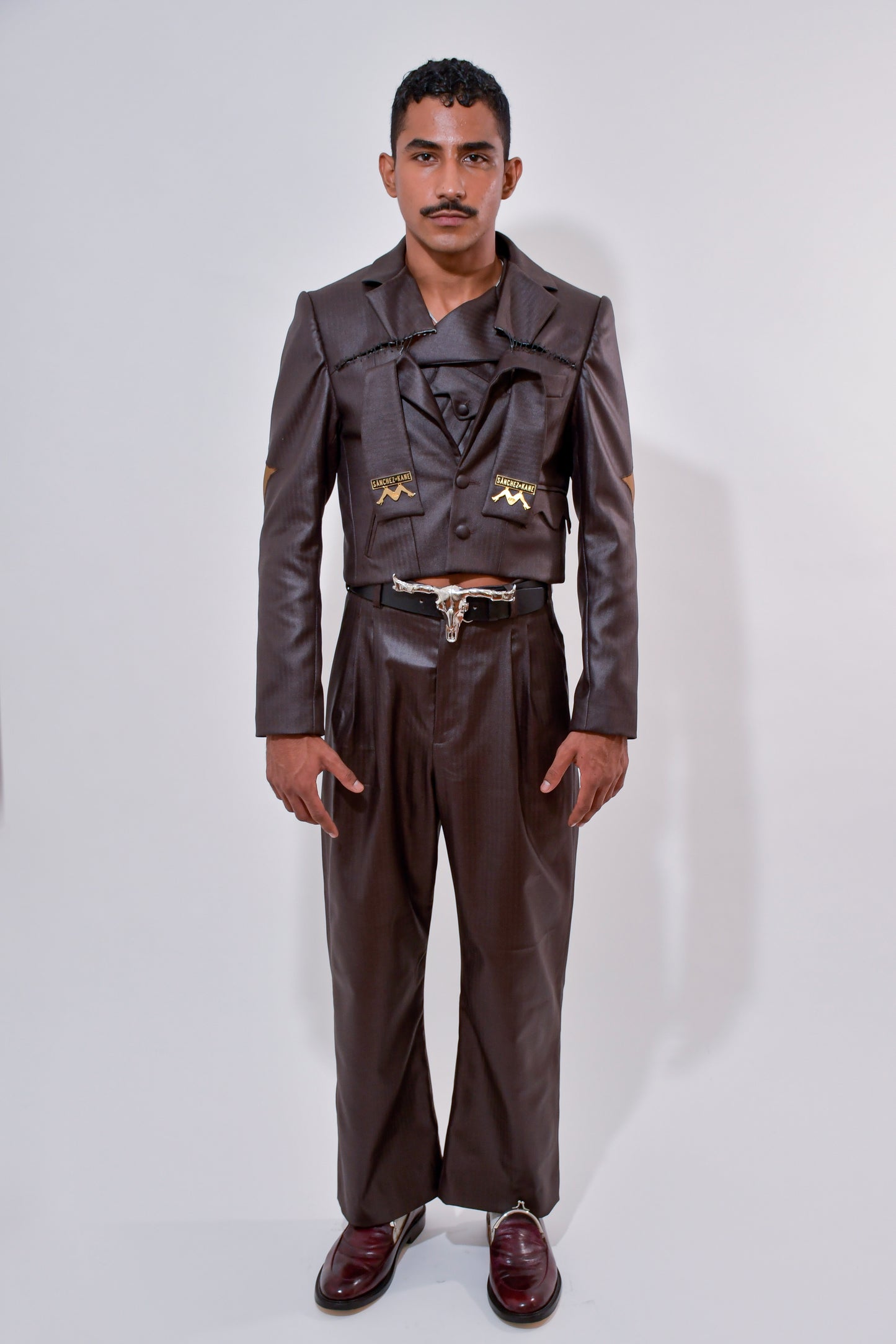 PINZAS DE LAVADO PLEATED TAILORED TROUSERS