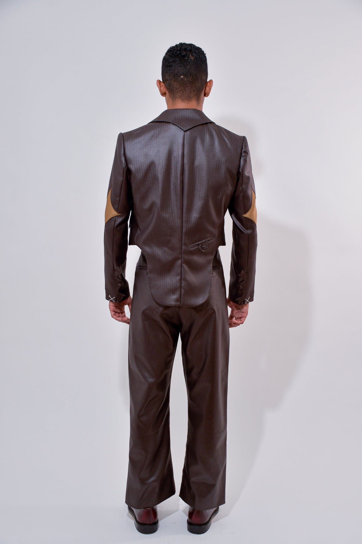 PINZAS DE LAVADO PLEATED TAILORED TROUSERS